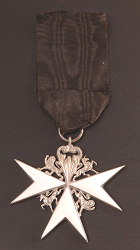 A medal conferred to Ho Kom-tong by St. John Ambulance Brigade