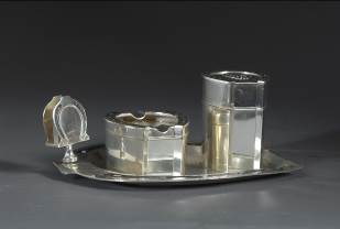 Tai Ensai's refined smoking paraphernalia, including a tobacco can, ash tray and a cigarette rest. Collection of Shenzhen Museum